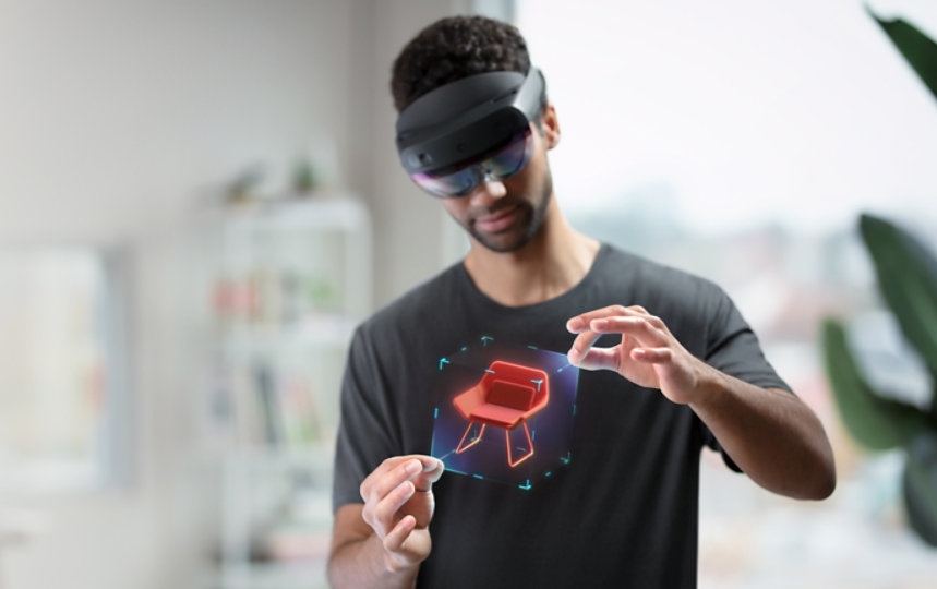 Person interacting with HoloLens 2. 