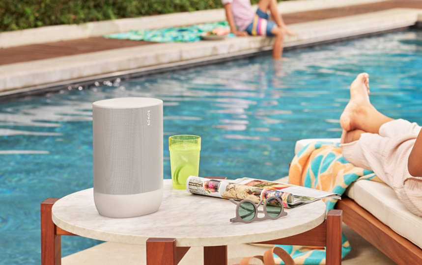 A white Sonos Move sitting poolside.