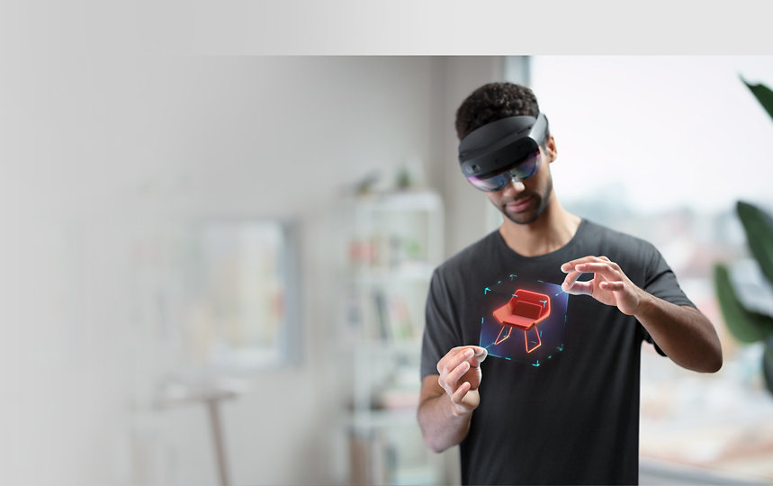 Eine Person interagiert mit HoloLens 2.