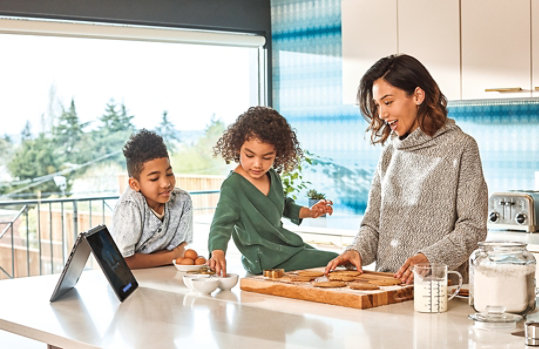 Family in a kitchen.