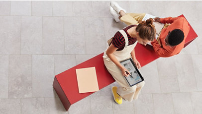 Image of two students discussing 