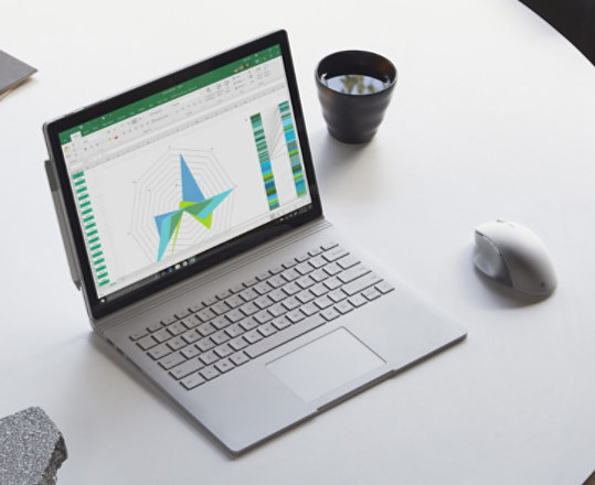 Surface Precision Mouse and Surface device on a table.