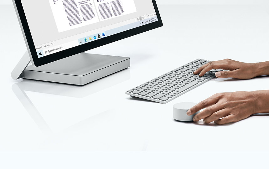 Surface keyboard, Surface Dial and monitor.