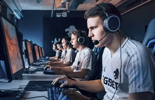 A group of gamers using the Steel Series Arctic Pro PC Gaming Headset.