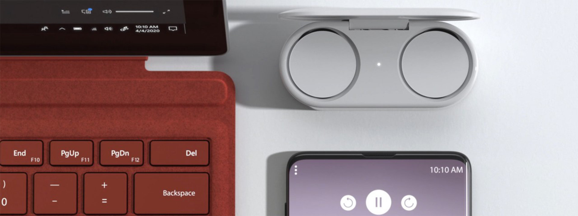 Surface Earbuds paired with a Surface device and a phone.