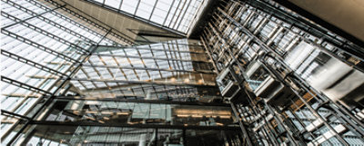 The inside of a large office building with many floors