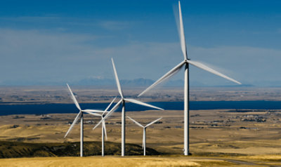 Large wind turbines in an open field