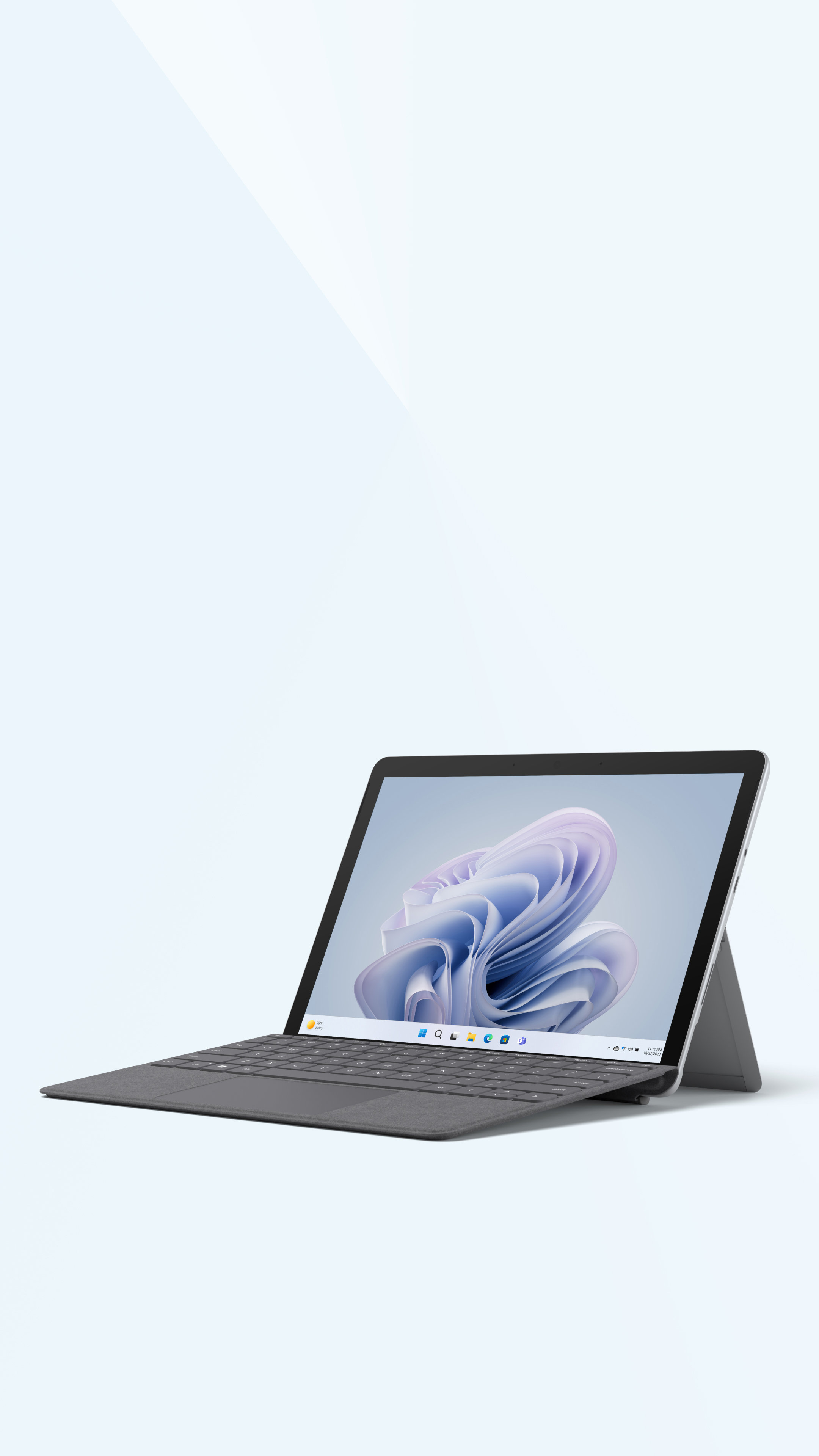 Angle render of Surface Go 3 Platinum with attached keyboard on a light blue background.