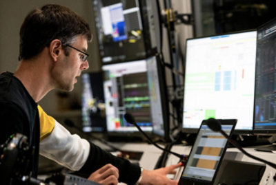 A men in black shirt working on a system