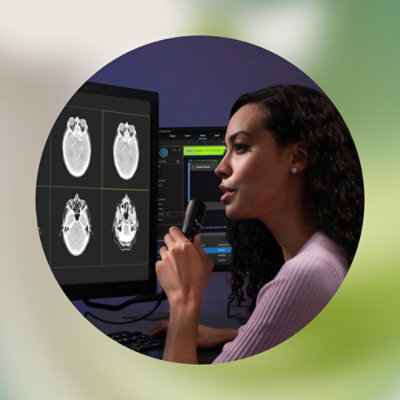 A woman looking at a computer screen.