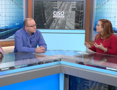 Theresa Payton, Mark Simos, and David Weston seated at a counter in a professional studio setting with CISO Spotlight Series and CISO city image in background.
