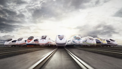 Neun Hochgeschwindigkeitszüge nebeneinander auf den Gleisen