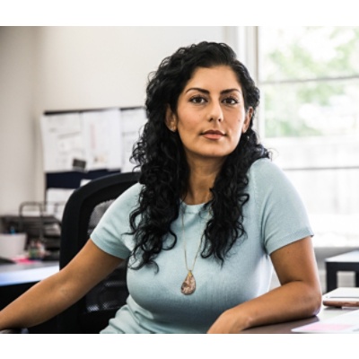 A person sitting at their desk.