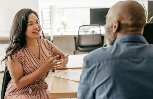 Group of people working on systems working together