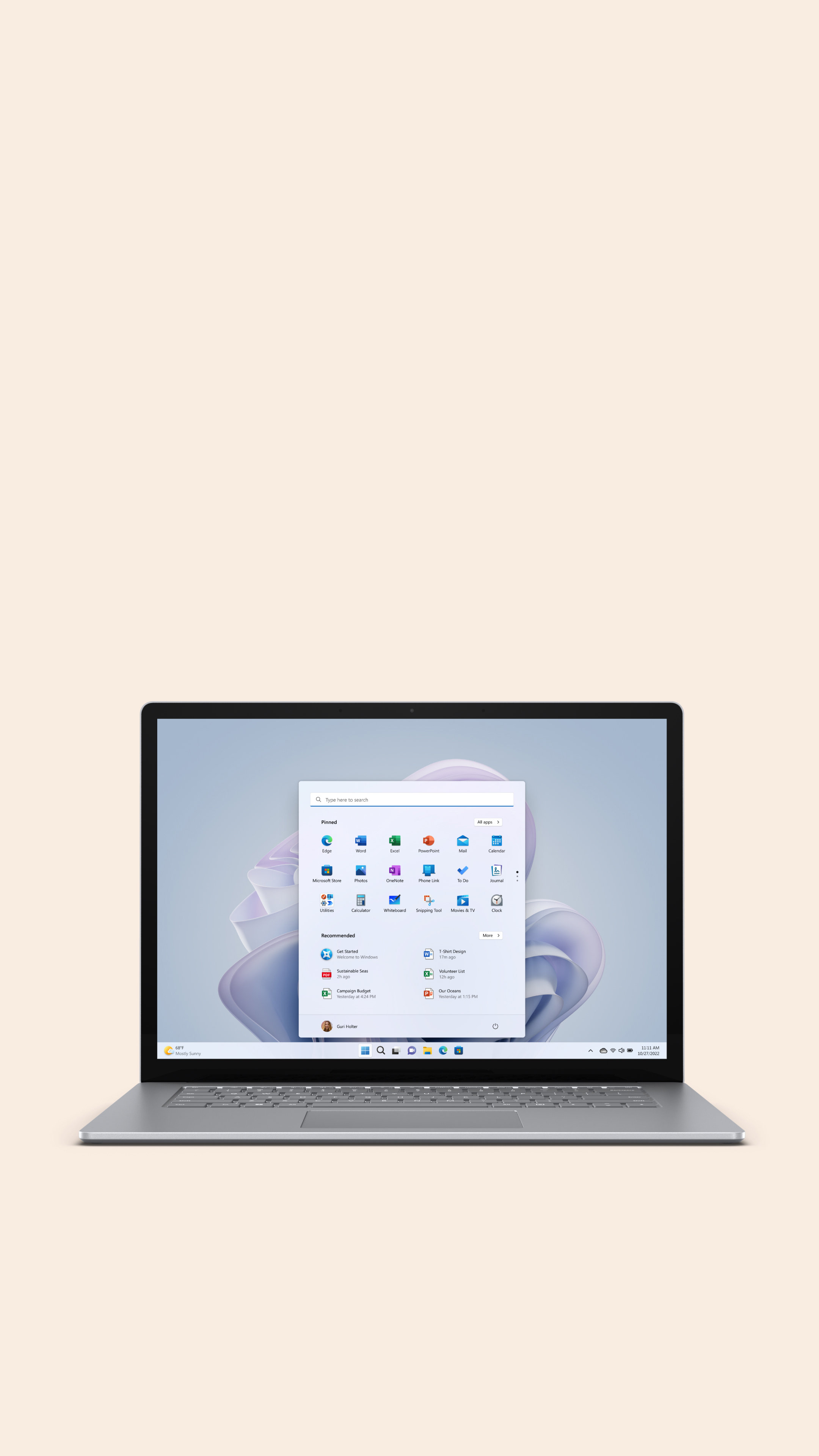 Surface Laptop 5 15" in Platinum with a Windows 11 Start screen.