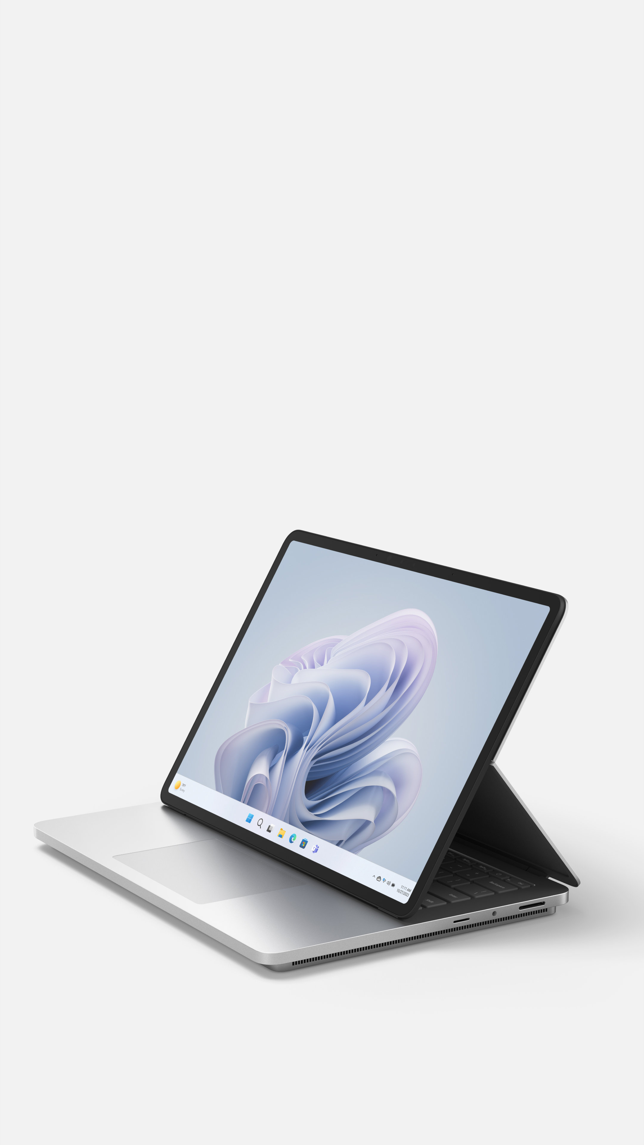 Surface Laptop Studio 2 in stage mode on a gray background.