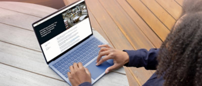 A person using a laptop.