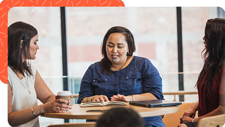 Three woman in a meeting