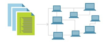 画像：書類と複数の PC