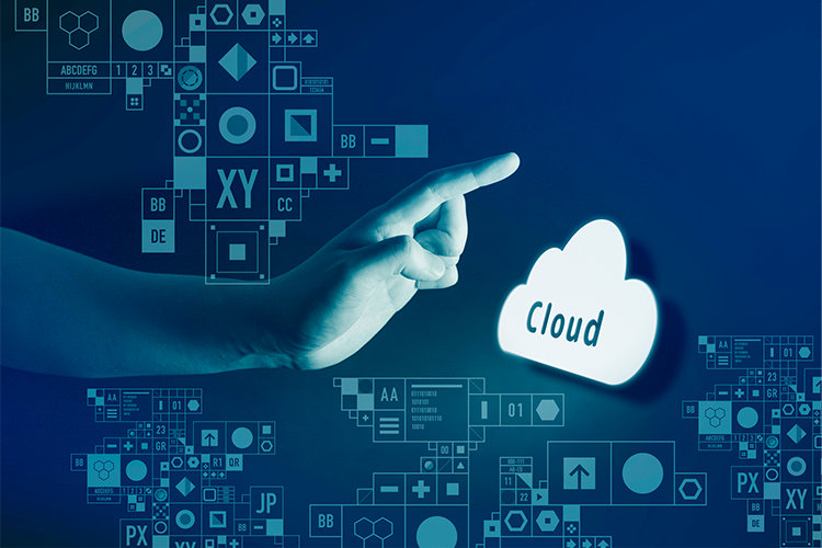 指が「Cloud」と書かれた雲のアイコンを指している。背景には様々な図形や文字が描かれている。