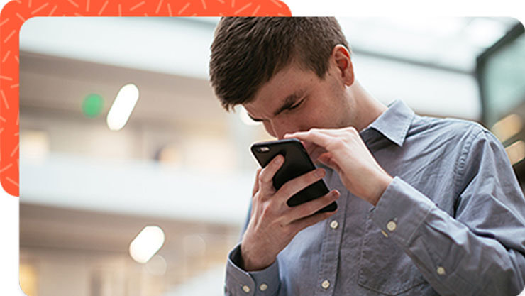 a man looking at his phone