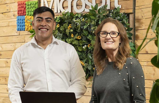 two microsoft employees smiling in the NZ office