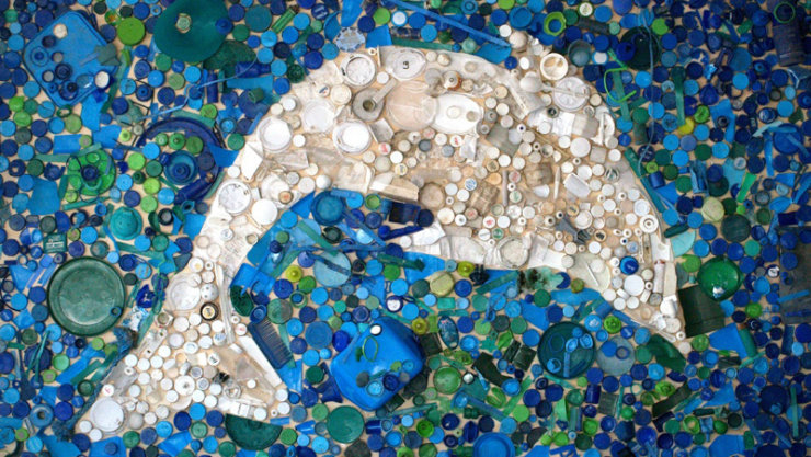 A dolphin made out of sea waste