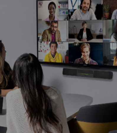 Two women attending a group Teams call remotely