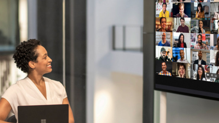 A female executive looking at the video conference screen