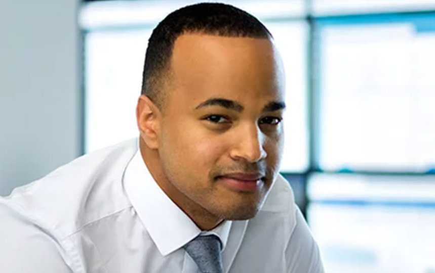 Portrait of male worker in open office setting