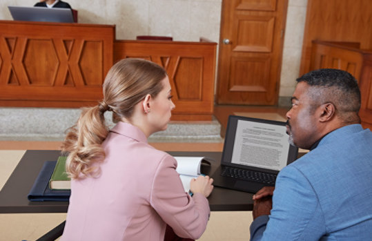 A man and a woman discussing something