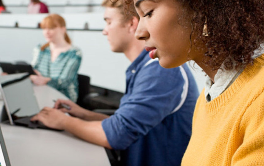 three people showing working on their laptops