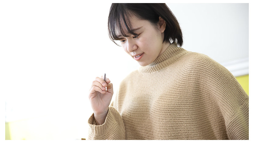 ペンを持っている内田泰歩さん