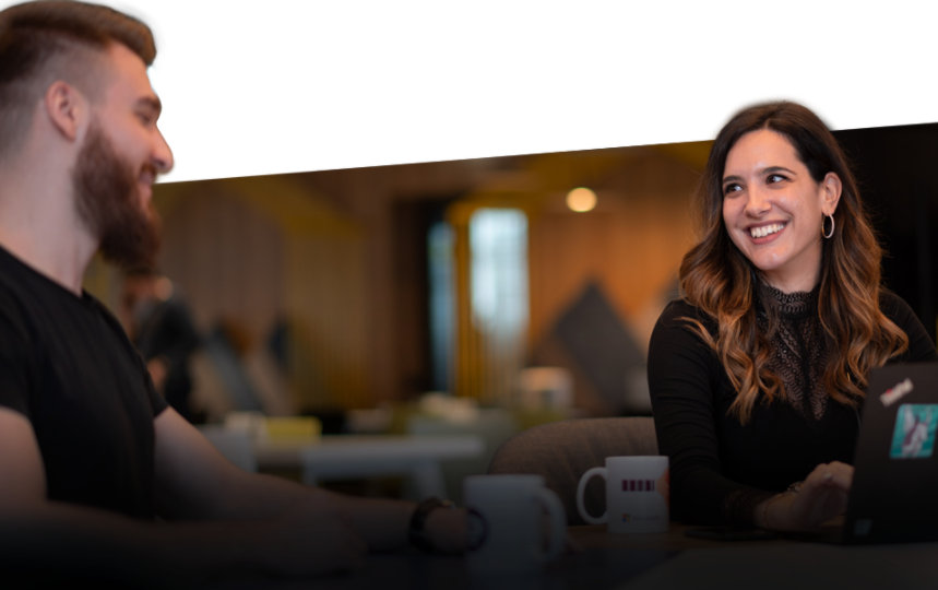 two people talking sitting at the table