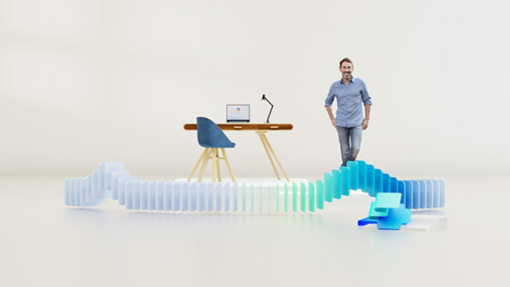 Mann steht neben einem modernen Schreibtisch mit Laptop und Lampe, umgeben von wellenförmigen, transparenten Strukturen in Blau und Grün, in einem minimalistischen, hellen Raumdesign.