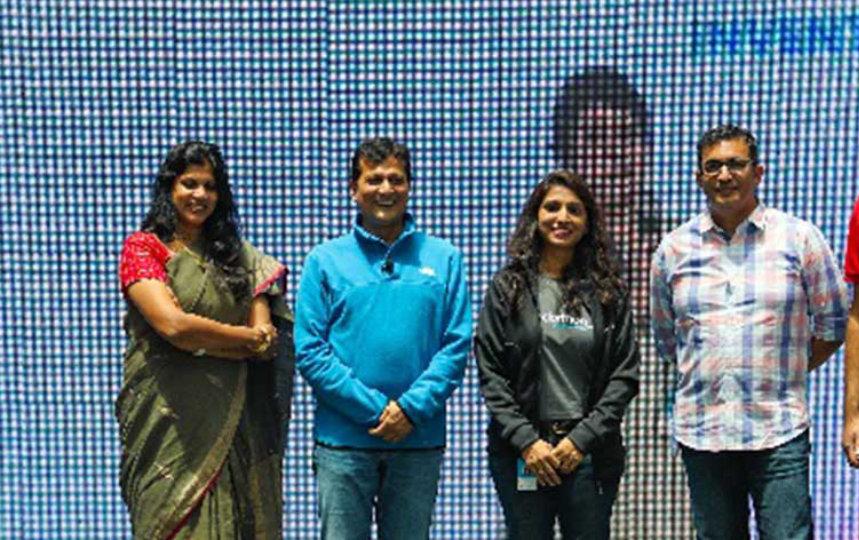 5 people posing standing