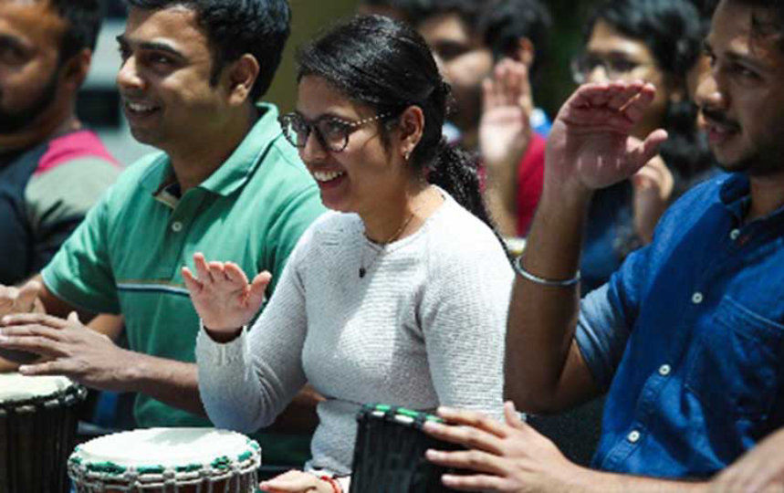 guys beating drums in an event