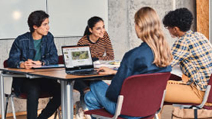 A group of employees interacting with each other