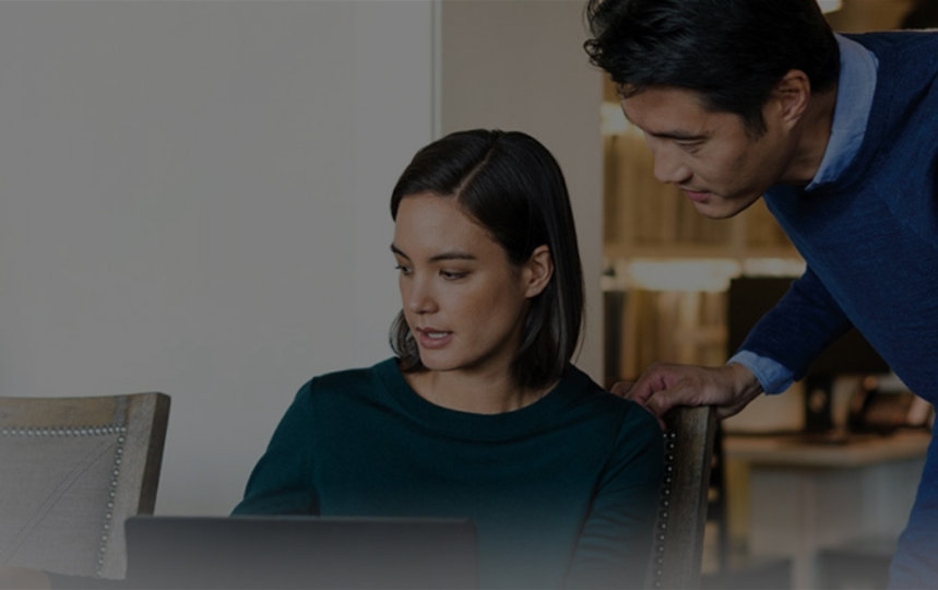 A female business owner speaking with a customer