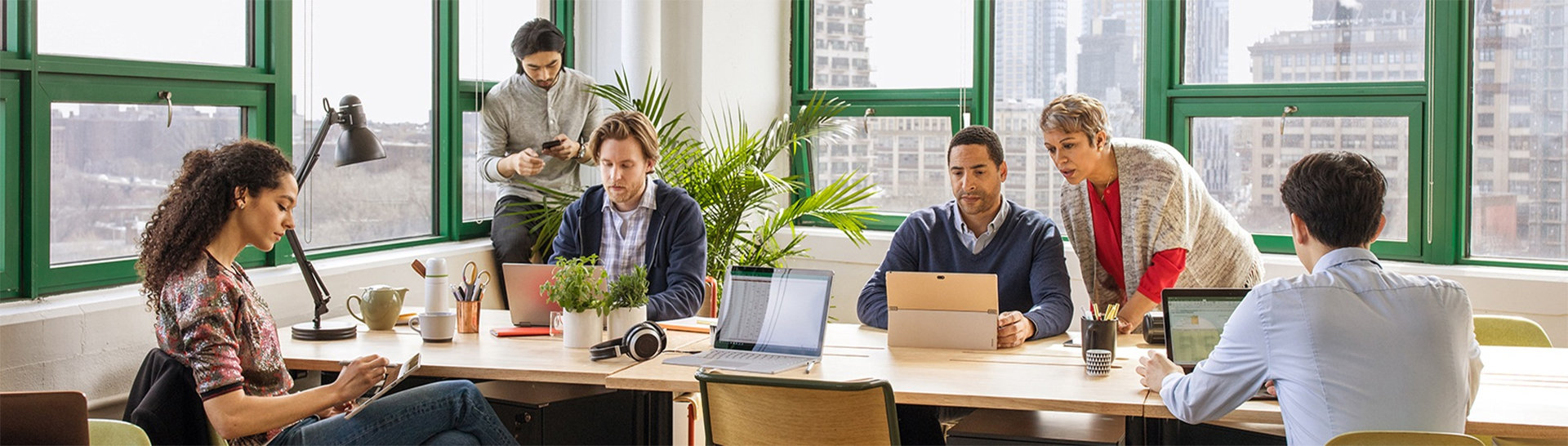 Employees in a meeting room in discussion