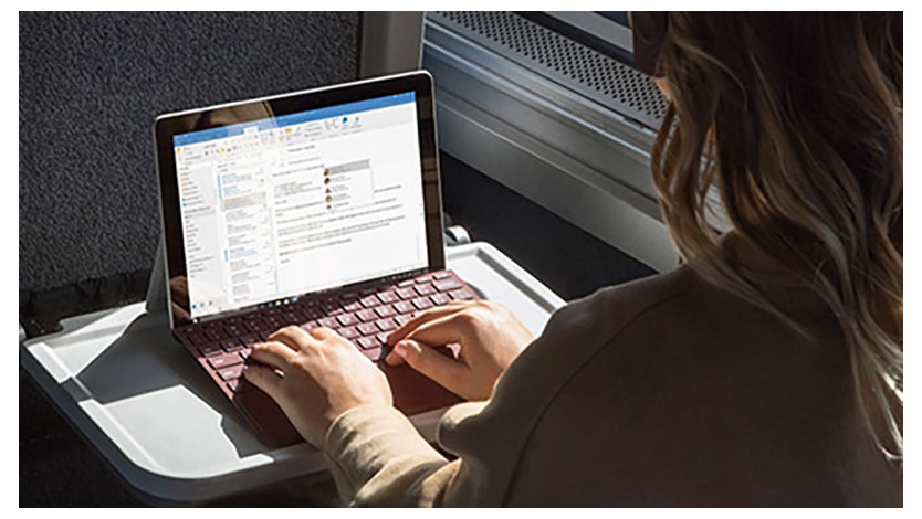 A person is using Microsoft Outlook on a device trying to send e-mails