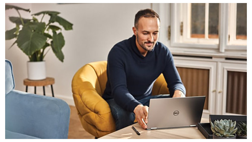 Man looking at his laptop