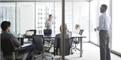 A group of people having discussion in a meeting room