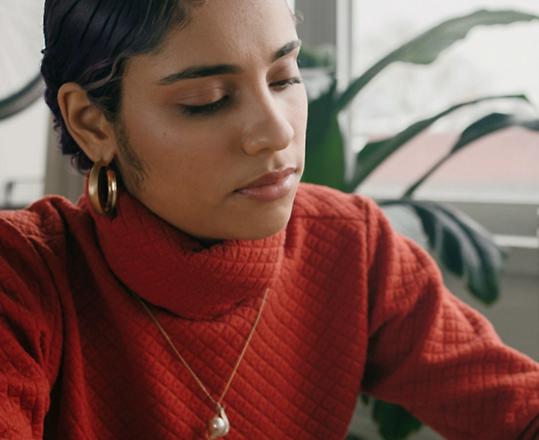 A person using a tablet and pen