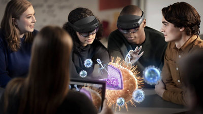 複合現実で図を表示するために、参加者のうち2 人がHoloLens 2デバイスを装着している5 人の会議。