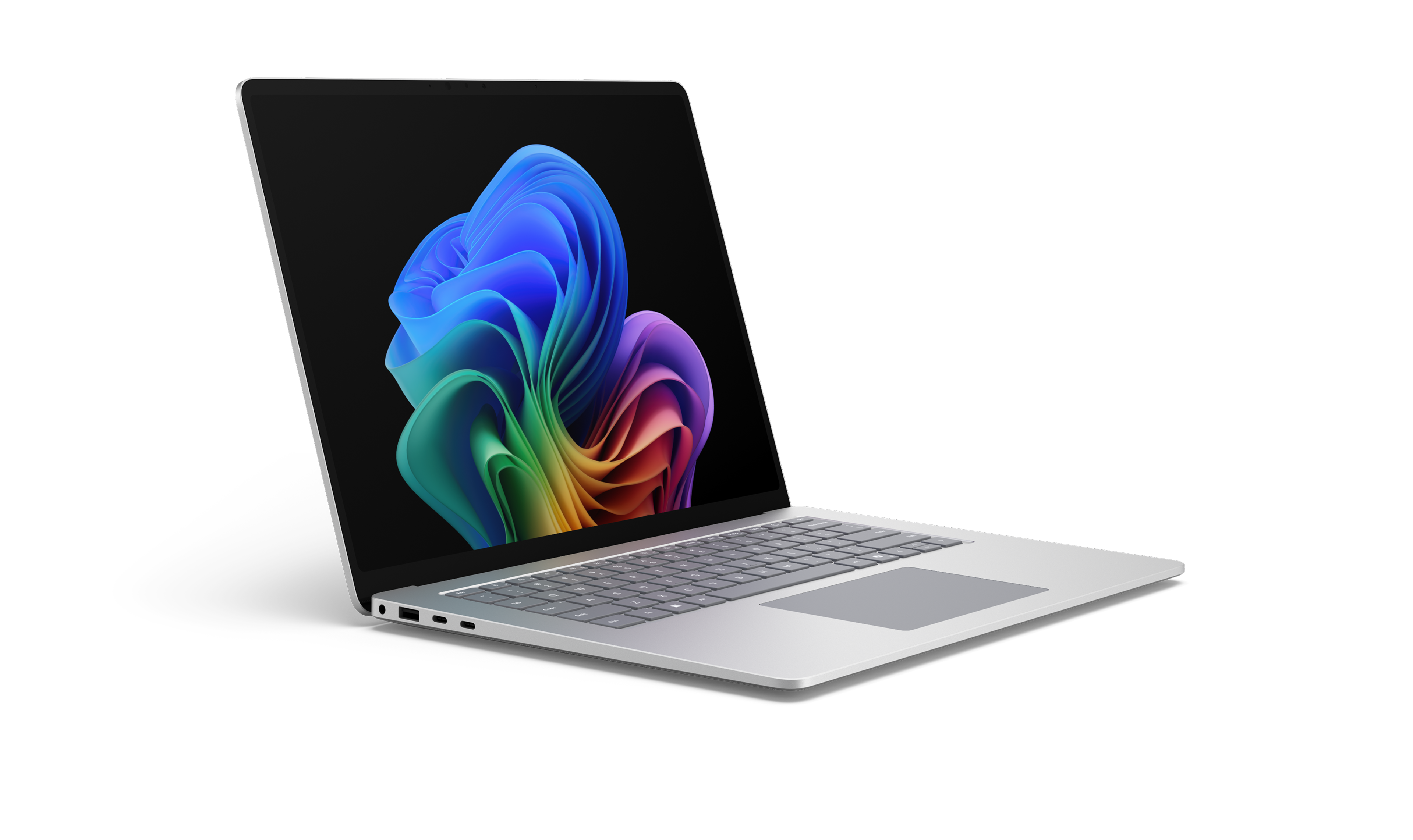 An open new generation Surface Laptop facing right displaying the rainbow bloom image