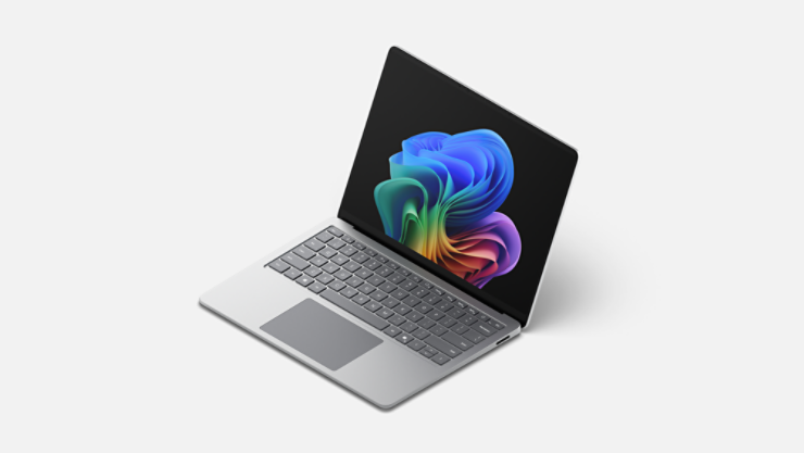 Un Surface Laptop aperto che mostra l'immagine del fiore arcobaleno