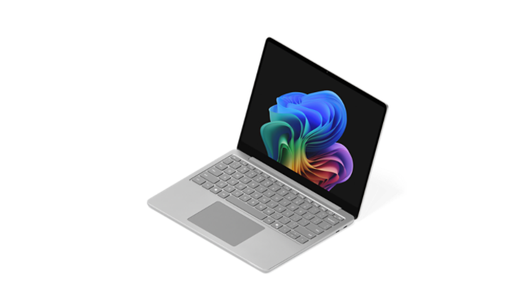 Un Surface Laptop aperto che mostra l'immagine del fiore arcobaleno