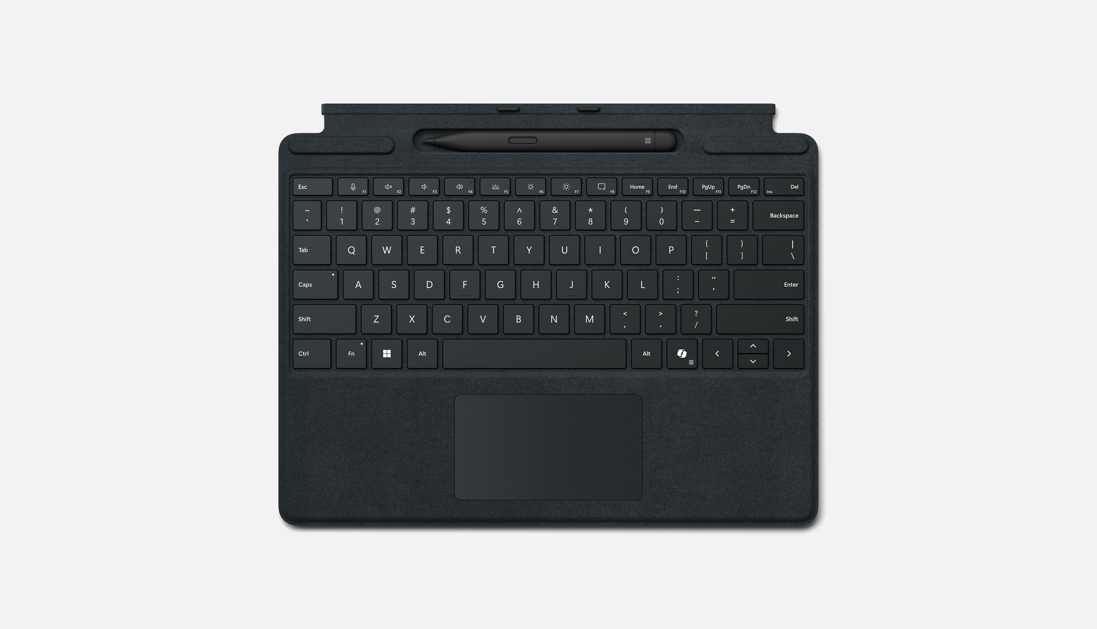 Vue de dessus d'un clavier Windows Surface Pro avec un stylet Surface Slim Pen, un grand pavé tactile et une touche Copilot.