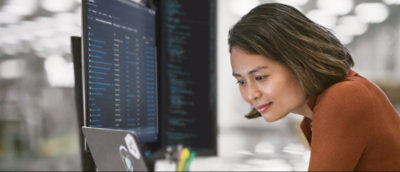 A person looking at a computer screen.